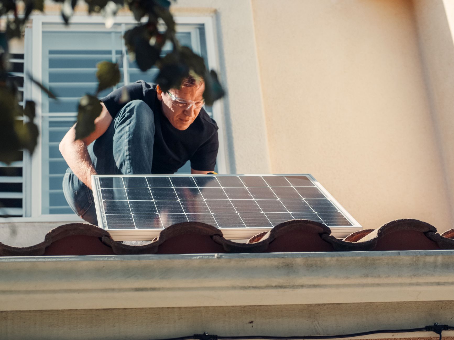 A licensed roofing contractor from Storm Guard Roofing inspecting a tile roof on a Summerlin South home.